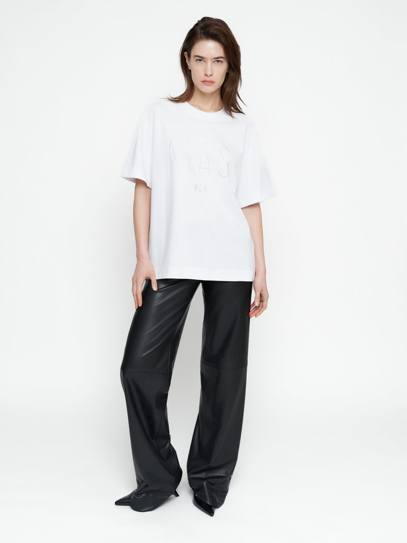 Balti marškinėliai su kristalais