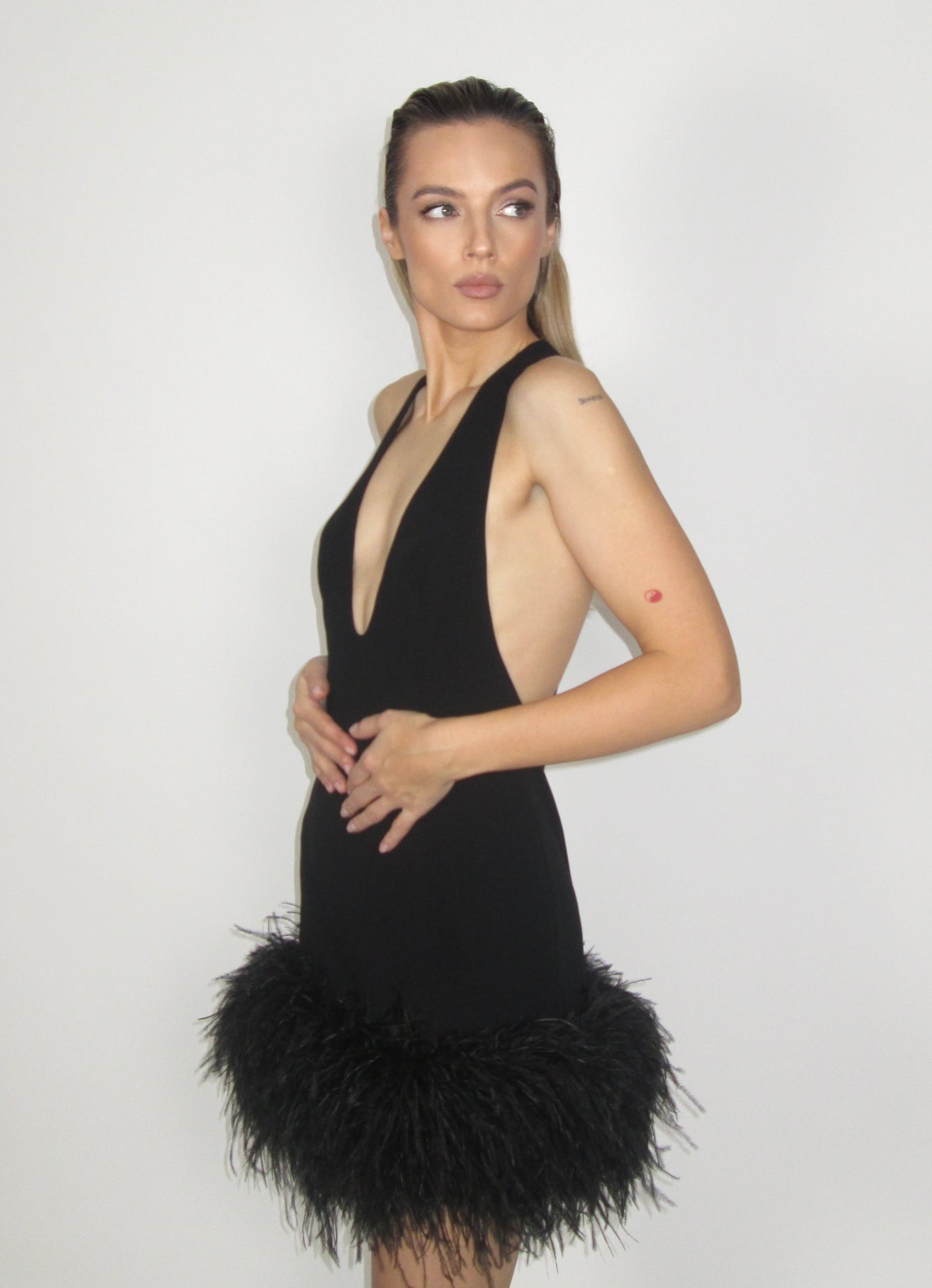 Short dress with feathers