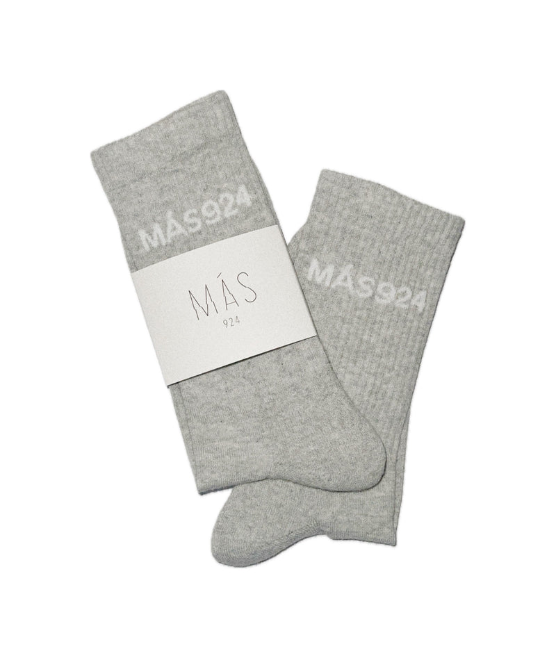 Pilkos kojinės su baltu logotipu