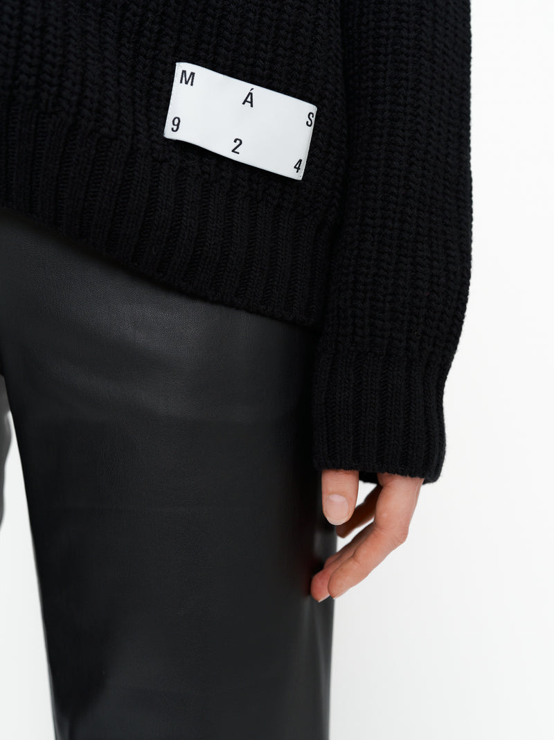 Black merino wool zip sweater