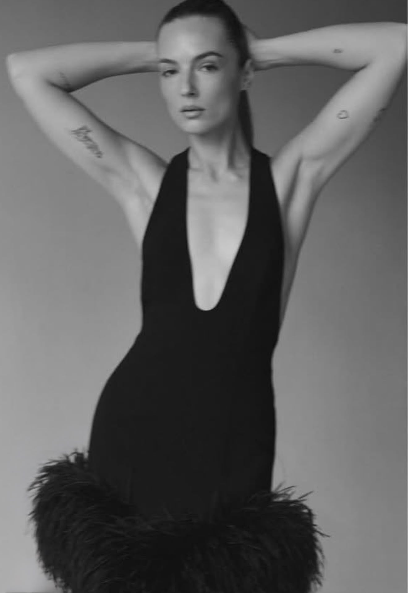 Short dress with feathers