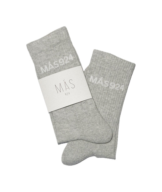 Pilkos kojinės su baltu logotipu