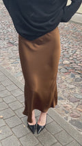 Rudas sijonas